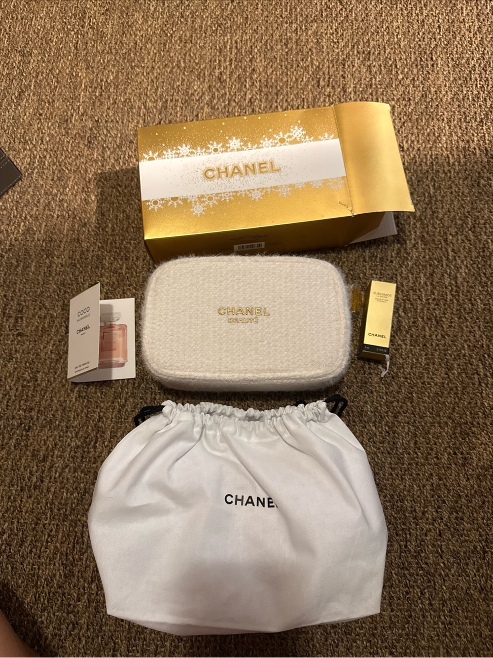 CHANEL Cream Bouclé Cosmetic Pouch with Gold Logo